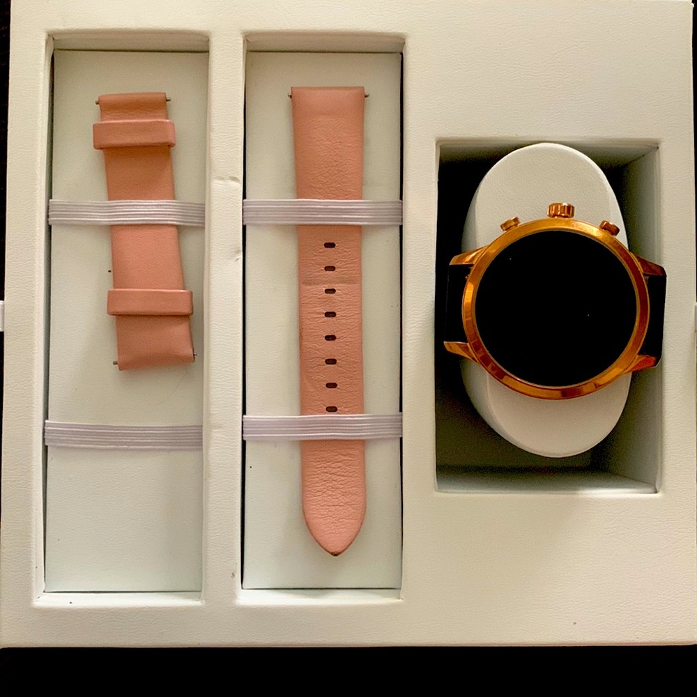 Michael Kors watch it comes with two bands and two chargers.